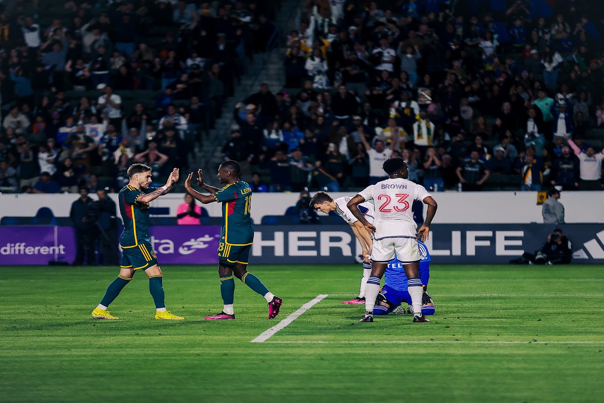 Tyler Boyd and Kelvin Leerdam of the LA Galaxy celebrate scoring a goal against the Vancouver Whitecaps in a 1-1 draw on Saturday, March 18, 2023. (Photo Credit: LA Galaxy)