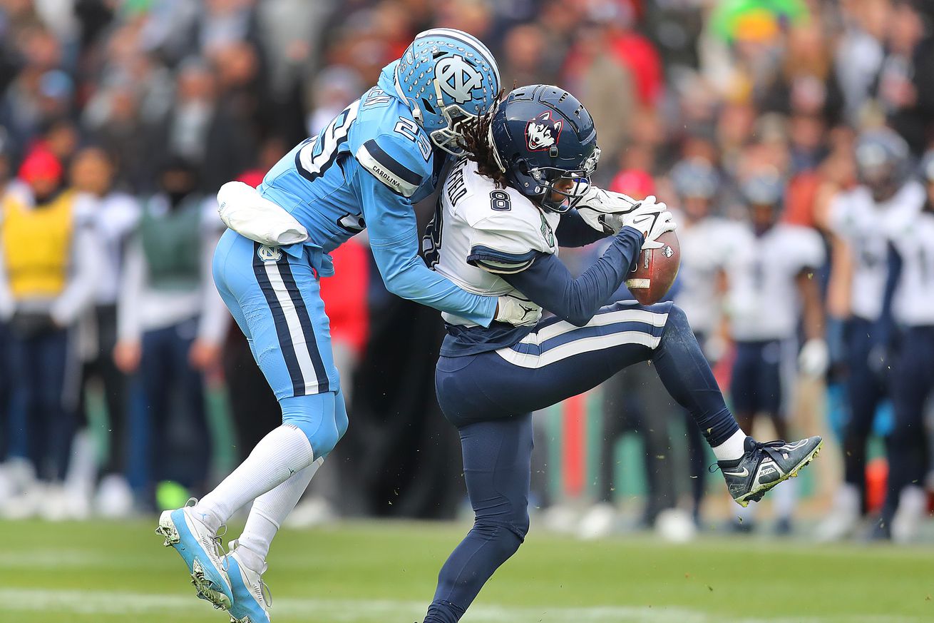 With Bill Belichick on deck as its next coach, North Carolina strikes out against UConn in Wasabi Fenway Bowl